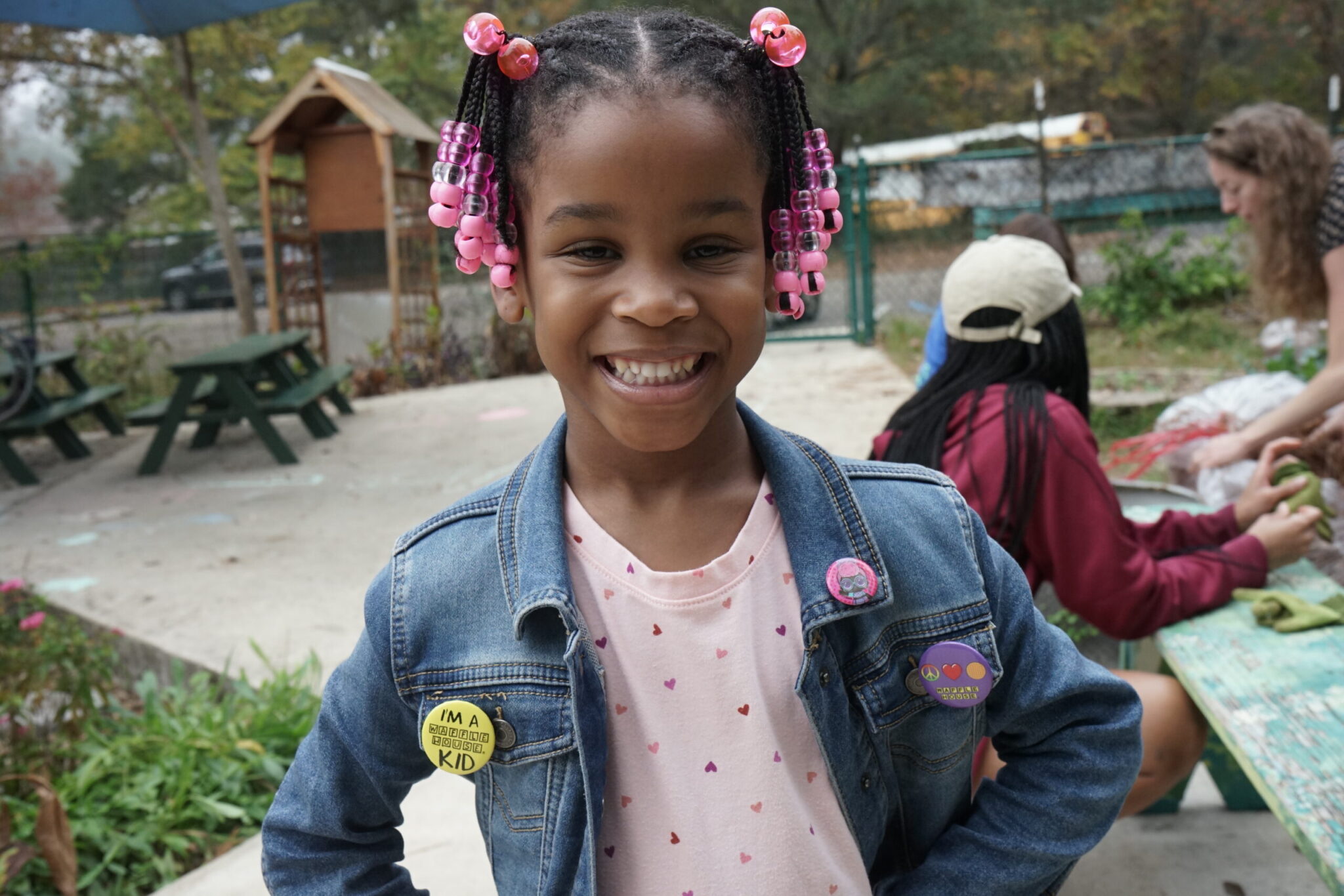 Happy Girl Smiling for photo - Corner Stone Learning Community