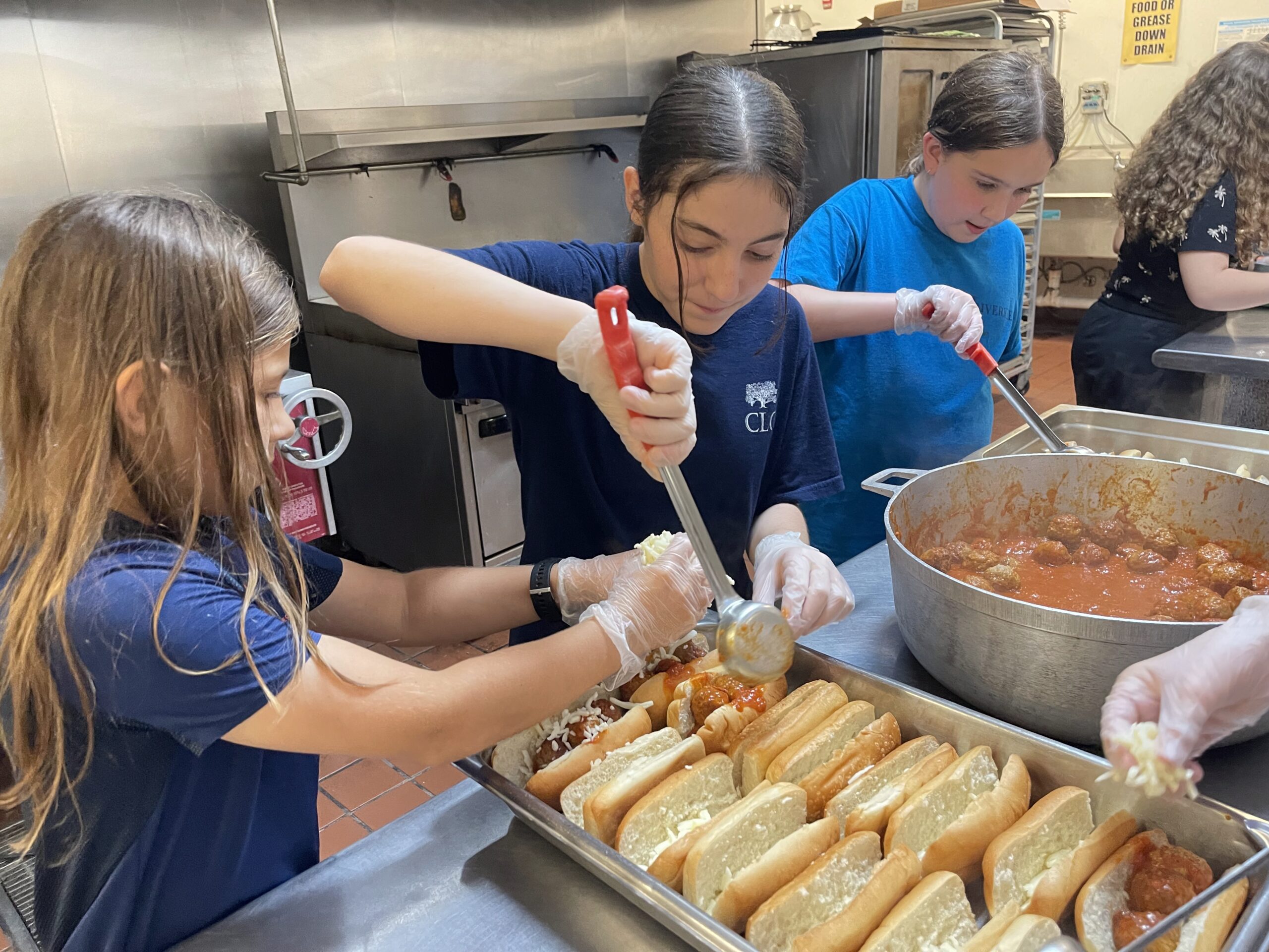Kids preparing sandwiches, happy- Corner Stone Learning Community